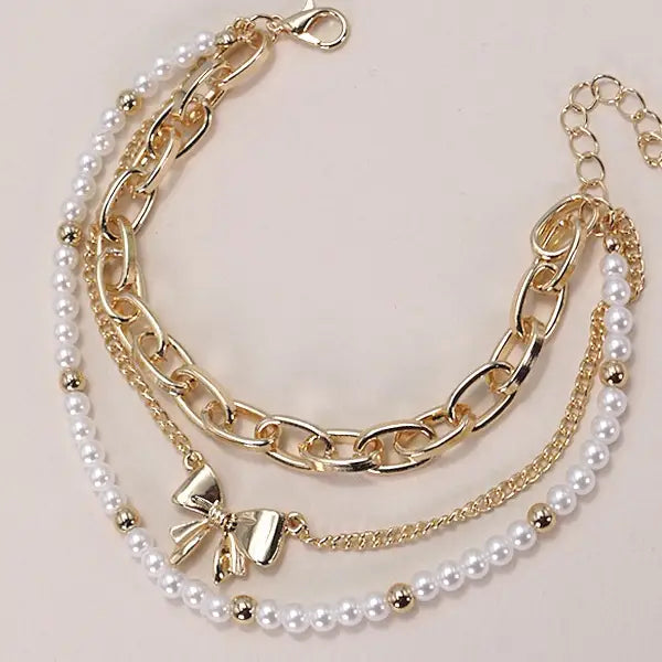 Dainty Pearl and Bow Bracelet Stack in Gold