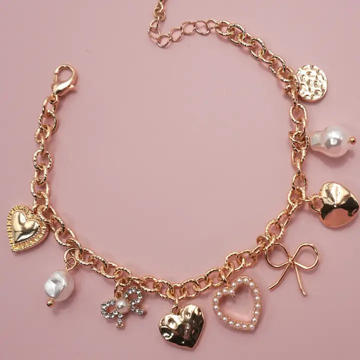Simple Charm Bracelet with Bows and Pearls