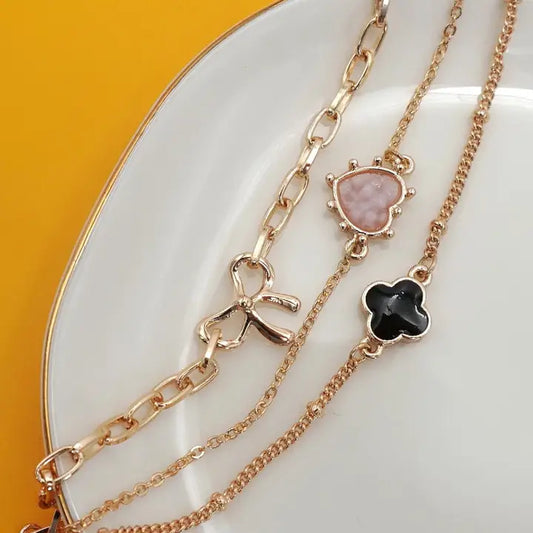 Layered Charm Bracelet in Gold